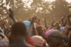 mission trip people dancing during daytime